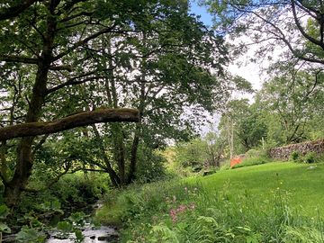 Beautiful grassy area next to the river. ideal for pennine way walkers.