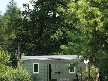Shepherds hut with decking and water proof sun canopy