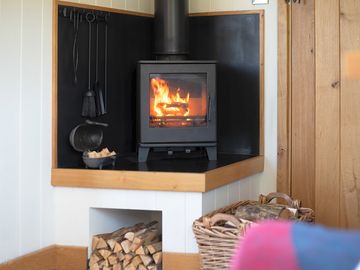 A romantic evening in, with the gentle glow of the log burner keeping you warm.