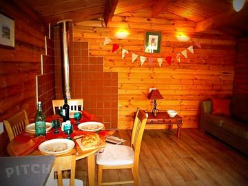 Inside wood cabin glamping style