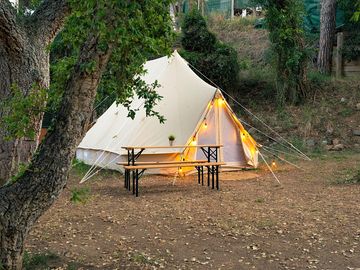 Bell tent with picnic table