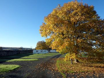 A lovely peaceful touring park with stunning views on a historic site with beautiful charm.