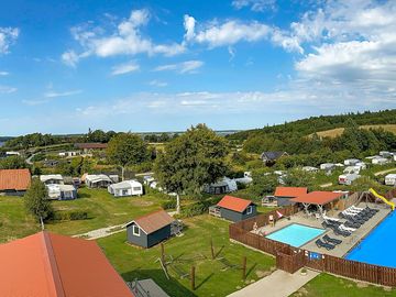 Heated swimming pool close to communal facilities and cabins
