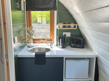 Kitchenette in one of our deluxe pods