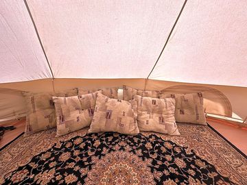 Soft pillows line the floor
