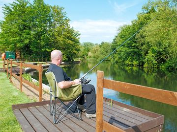 Fishing from the riverbanks at the site