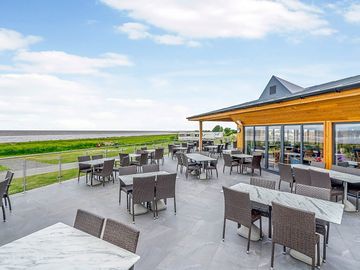 Have a seat outside our sandpiper bar and grill.