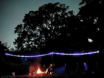 Fairy lights and campfire