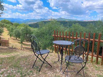 Table and chairs with a view