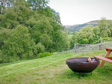 Each pod has its own kadai fire bowl with grill, picnic bench and camping chairs