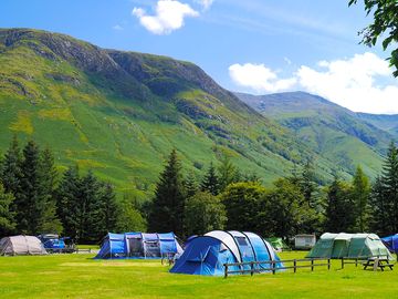 Electric tent pitch with ben nevis in the background