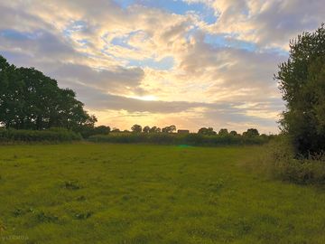 Lovely sky over the field