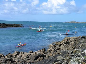 Surfing the waves at clifden