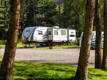 Fully-serviced gravel and hardstanding touring pitch