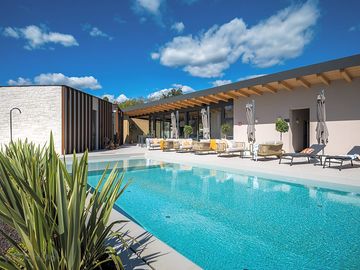 Pool and sunloungers