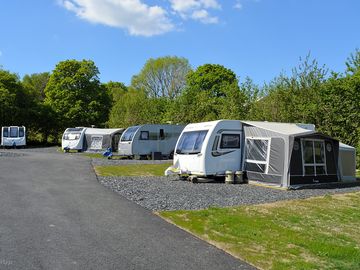 Fully-serviced hardstanding touring pitch