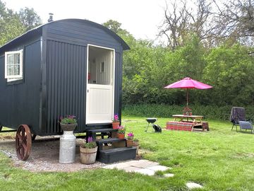 Picnic table, barbecue and comfy loungers