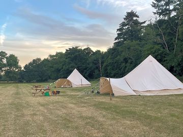 Each tent comes with a firepit and picnic bench