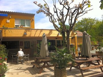 The bar terrace where you can have a drink, relax and meet new friends