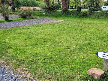 Deer's corner pitch on hardstanding and grass, the closest pitch to the shower block