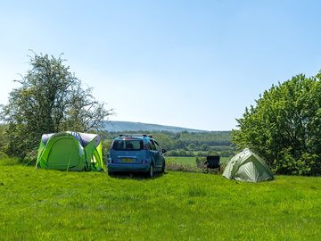 Grass pitch with view of the south downs