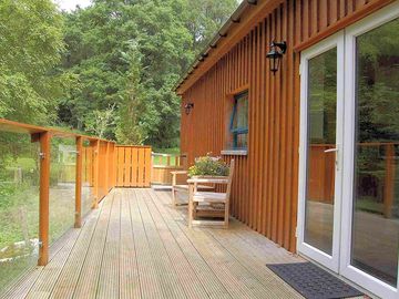 Waterfall log cabin