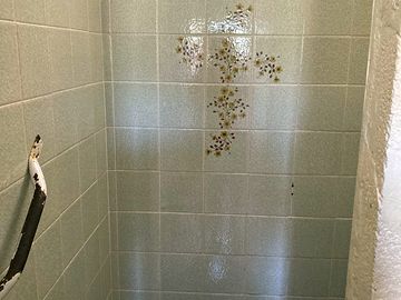The showers were from the 1970s, at a guess