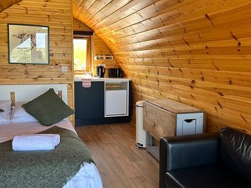 Living area in one of our premium pods