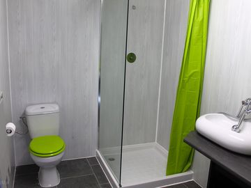 The shower block has a family-friendly room