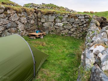 Main camping area showing cooking platform