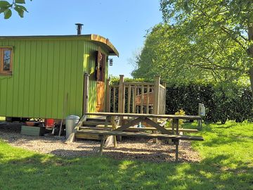 The croft hut entrance and south facing veranda with picnic table