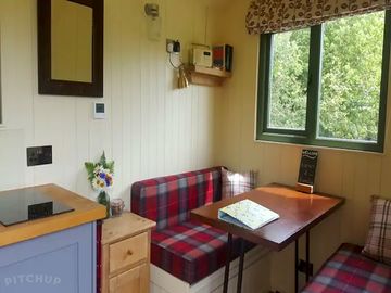 The dining area converts easily to a comfy double bed