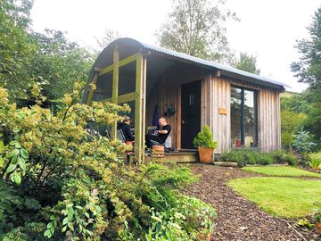 Sitting on willow pod verandah