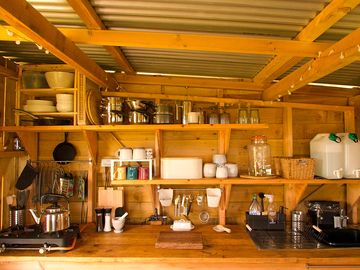 Well equipped `home from home', camping kitchen.