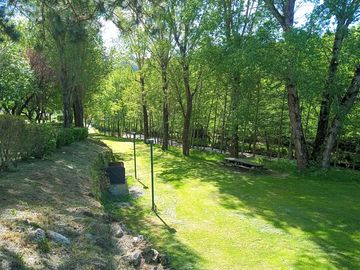 Picnic tables and communal barbecues