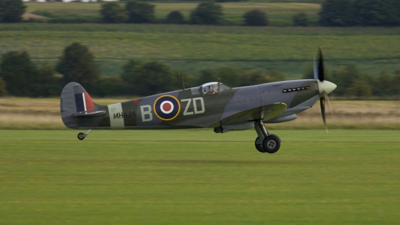 A spitfire in action at IWM Duxford (Peter Bromley/Unsplash)