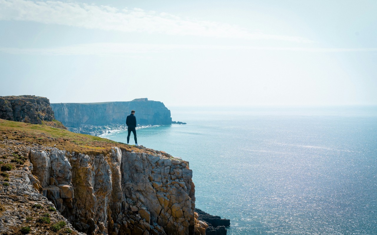 St Govan’s Chapel on the Pembrokeshire Coast Path (Zoltan Fekeshazy/Unsplash)