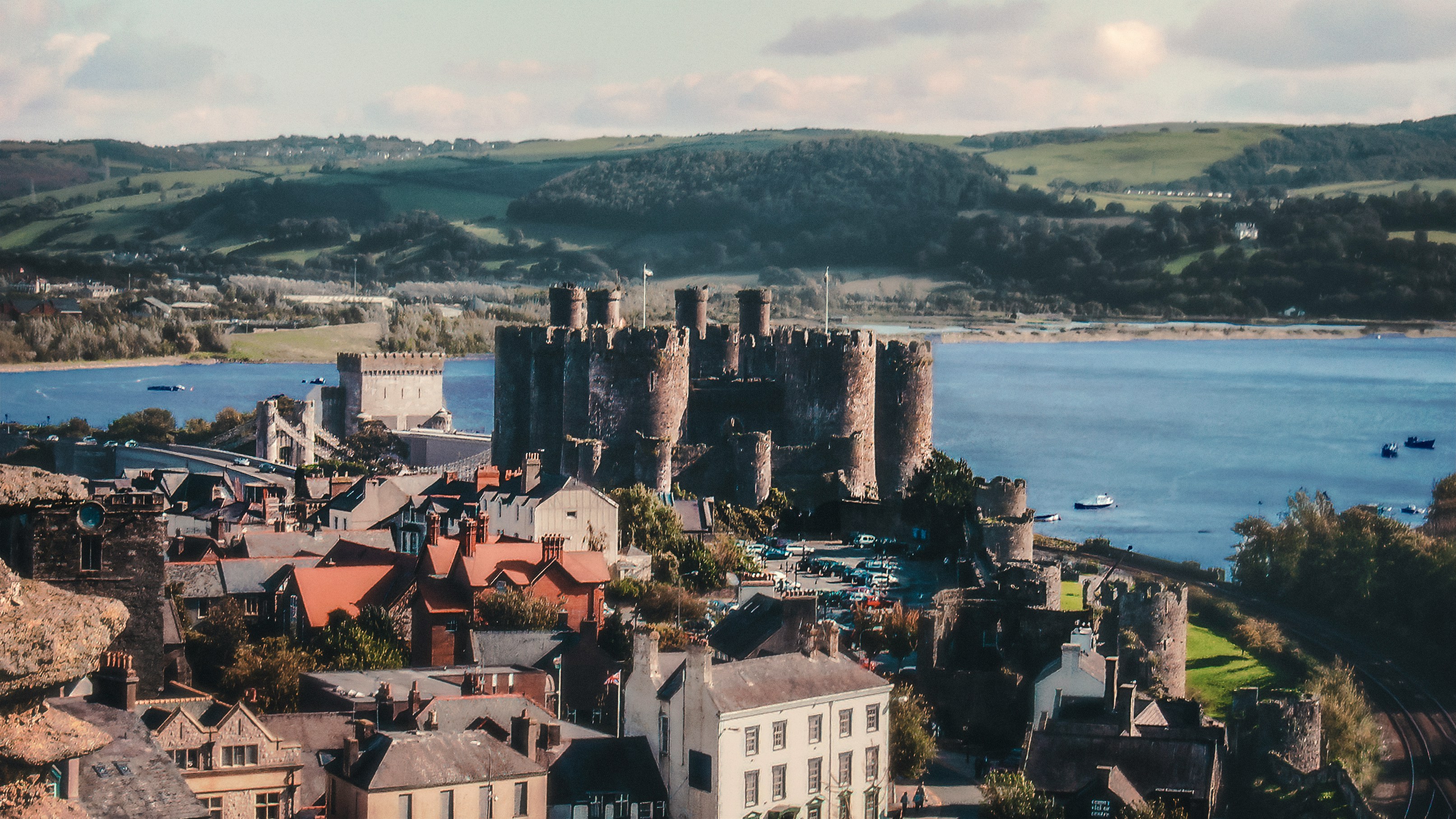 Conwy Castle dominates the town and its skyline (K Mitch Holdge/Unsplash)
