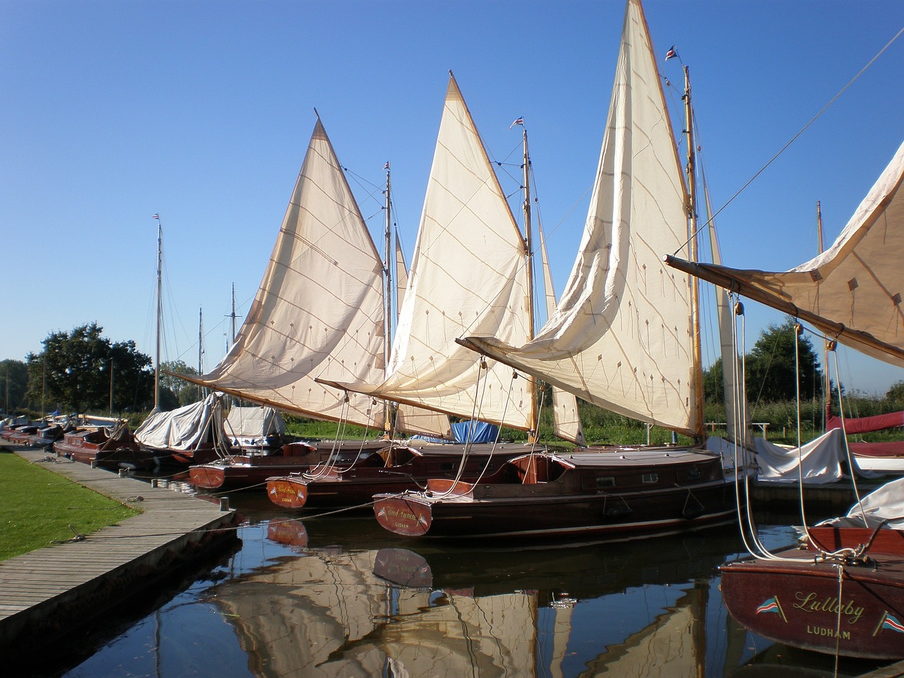 Traditional wooden sailing boats on the Broads