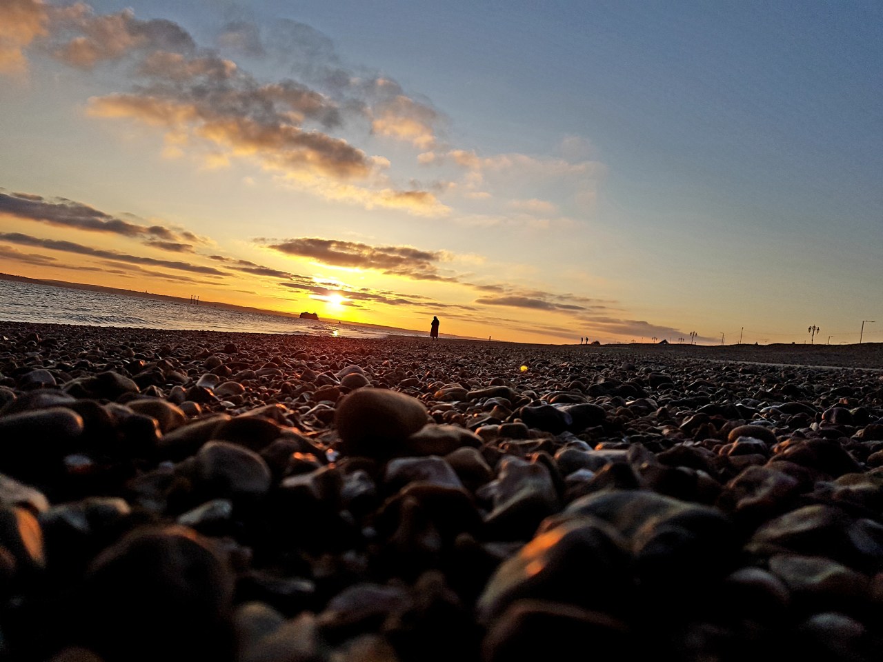 Sunset across the ocean at Southsea, Hampshire Sunset across the ocean at Southsea, Hampshire (Peter Chiykowski on Unsplash)