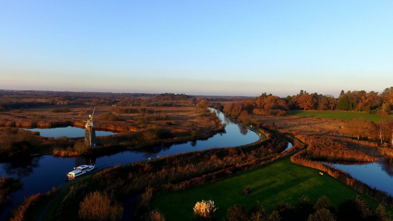 Boating on the Norfolk Broads (Andrew Banner/Unsplash)